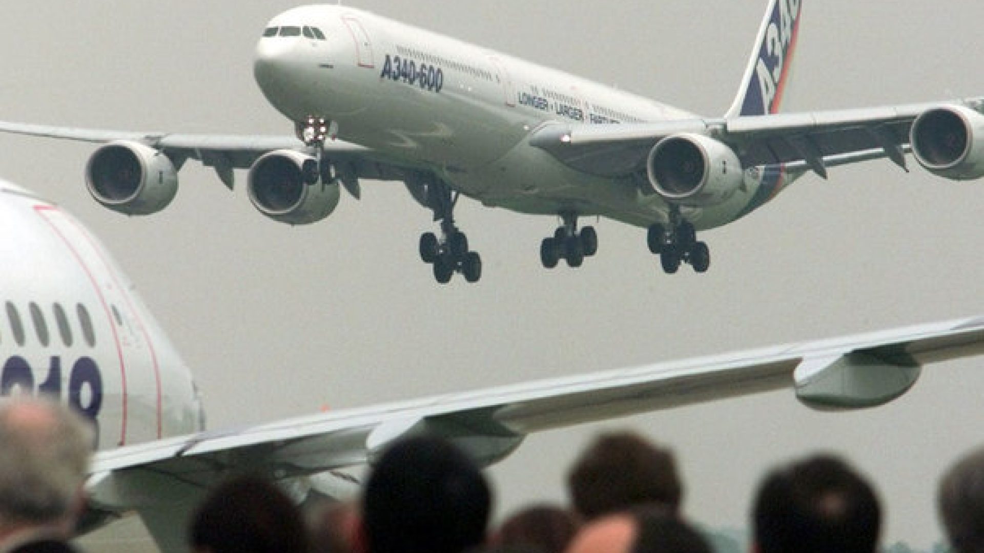 Airbus Industries A 340-600 plane flies next to an A-318 aircraft during a presentation at the Inter..